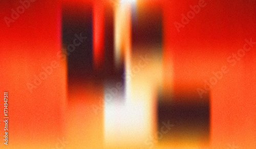 Abstract orange and brown blurred background with film grain noise, textured, warm, and vibrant color gradient.