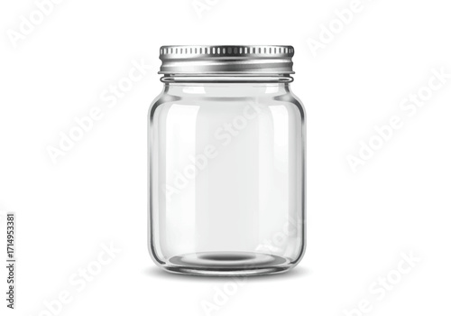 Clear glass jar with a silver ridged lid resting on a white surface