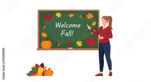 Teacher Pointing at Welcome Fall Chalkboard with Autumn Decorations.
