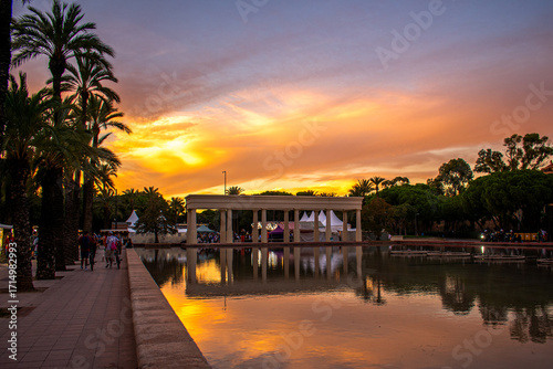 Sunset over pool, Turia Gardens, Valencia, Spain