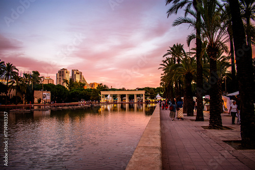 Sunset over pool, Turia Gardens, Valencia, Spain