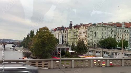 Prague from a car window. Car ride around Prague. Car ride across the Vlatva River in Prague.