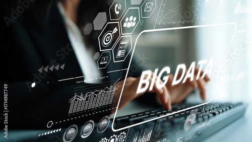 Professional Woman Analyzing Big Data Trends on Computer with Infographics and Graphical Charts in Modern Office Environment. Asymptotic smart data analytic.