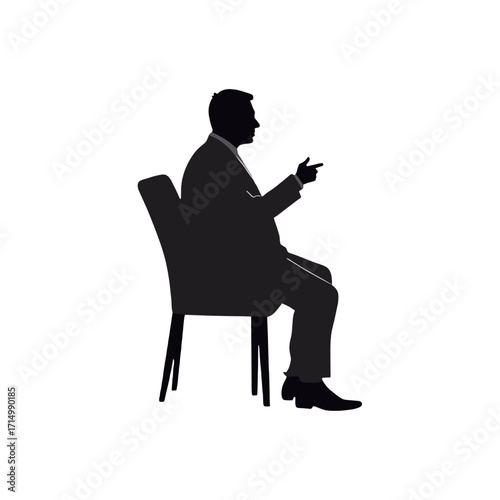 Businessman sitting and gesturing while talking in a chair  