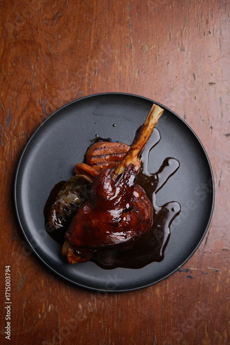 Принти на полотні A Delectable Gourmet Lamb Shank Beautifully Presented on a Plate