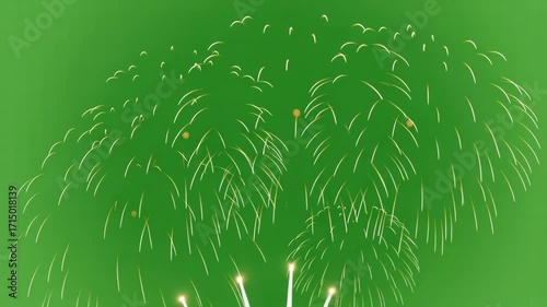 Dazzling golden fireworks explode across a vibrant green night sky, celebrating a grand event.