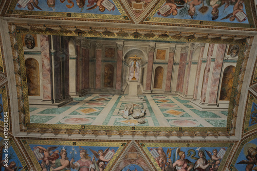 Perspective view of renaissance ceiling and illusionistic painted architecture trompe l oeil columns arches and tiled floor museum room interior Rome Italy heritage. High quality photo