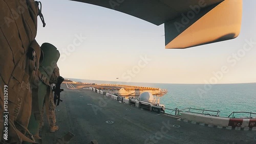 Marines Boarding Military Aircraft on Navy Ship
