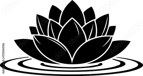 Elegant black lotus flower silhouette floating serenely on rippling water surface