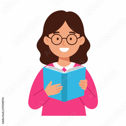 A young girl with glasses wearing a pink shirt is happily reading a blue book.