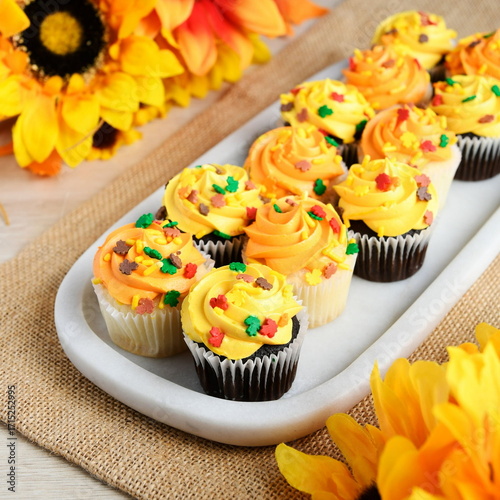 Autumn Cupcakes with Yellow and Orange Frosting Decorated with Sprinkles