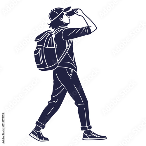 A person wearing a backpack and a cap walking and looking through binoculars into the distance