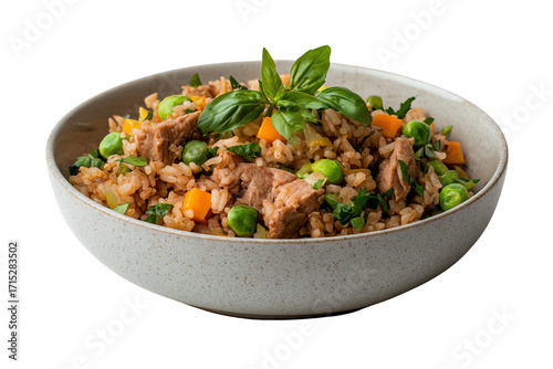 Delicious rice bowl with tuna, vegetables, and fresh basil on a white isolated background.