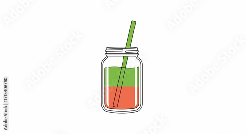 Layered Green and Orange Juice in a Mason Jar with Straw.