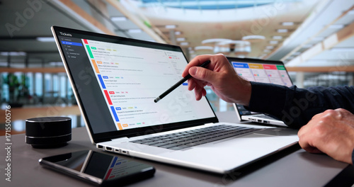 Tableau sur toile Senior Man Provides Remote Technical Support