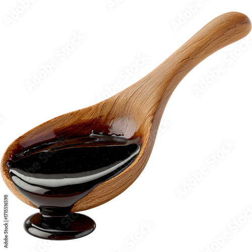 molasses on a wooden spoon	
