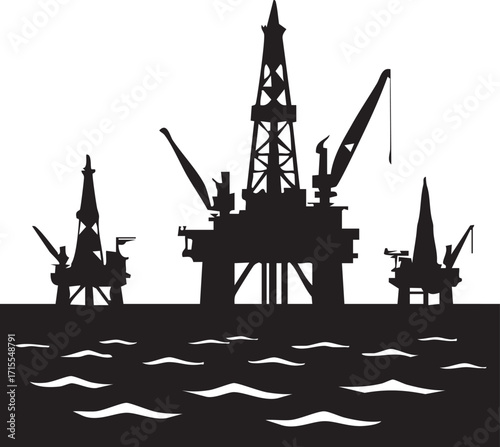 Silhouette of oil rigs at sea