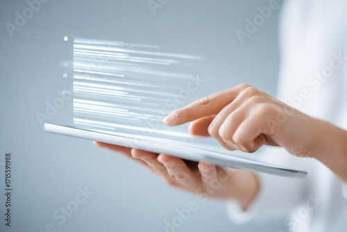 person holding tablet displaying list of job vacancies while soft ar blurred white text bars overlay screen