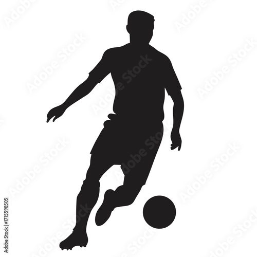 Silhouette of a soccer player in motion with a football