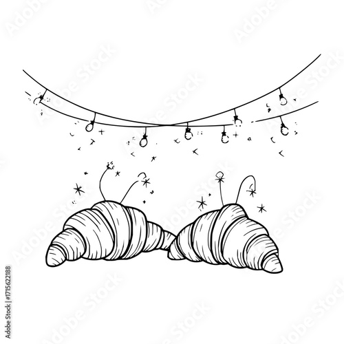 Two croissants with antennae under a string of lights with stars and small marks around them
