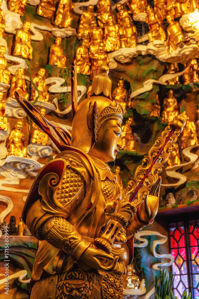 Fototapeta premium Close-up of golden statues, Longhua Temple, Shanghai, China
