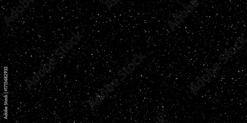 Terrazzo black background with scattered gray and white dots. Rock spatter stone marble backdrop. Black wall texture with noise overlay pattern. Vintage quartz terrazzo flooring.	
