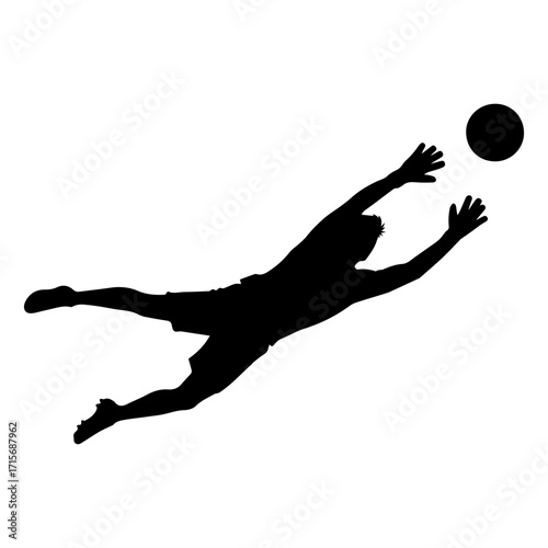 Silhouette of a soccer goalkeeper jumping to catch the ball