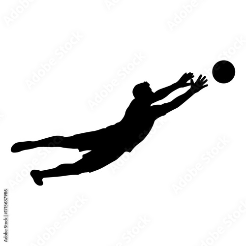 Silhouette of a soccer goalkeeper jumping to catch the ball
