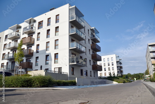 Blue sky and newly constructed, modern residential buildings in Wroclaw, Poland.