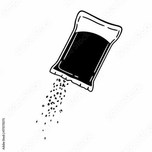 Black salt sachet spilling contents on white background  