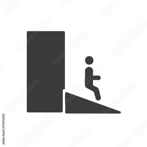 A clear graphic icon illustrates a person in a wheelchair descending an access ramp next to a building, representing crucial universal design and inclusive mobility.