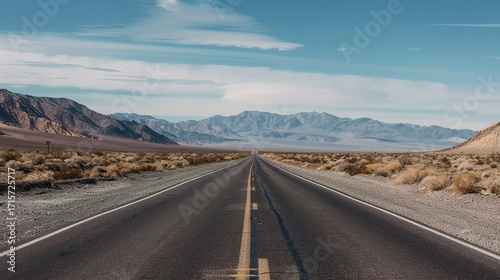 Desert road scenery Arid Serenity: Breathtaking Desert Road Scenery – A Long, Winding Asphalt Road Stretching Through Golden Sand Dunes and Scattered Desert Shrubs, Under a Clear Blue Sky