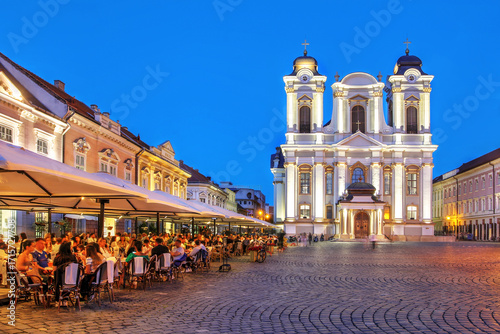 Roman-Catholic Dome, Union Square (Piata Unirii) in Timisoara, Romania during a summer evening