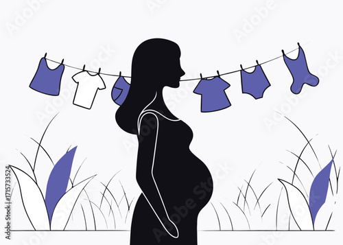 Pregnant woman silhouette with baby clothes on a clothesline