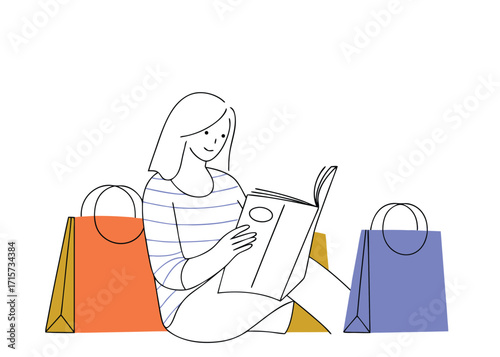 Woman reading magazine surrounded by shopping bags