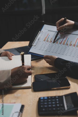 Accounting company provide finance and taxation planning for profitable cash flow, Auditor and accountant team working in office, analyze financial data and accounting record with calculator.Insight