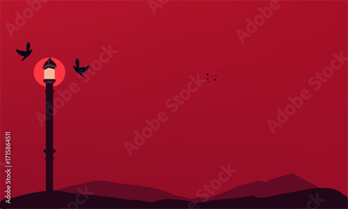 A striking minimalist flat design illustration featuring a tall street lamp emitting a warm glow, silhouetted birds in flight, and subtle mountain outlines against a dramatic, gradient red sky, evokin