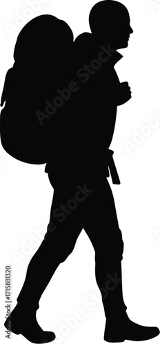 Silhouette of a Hiker Walking with a Backpack