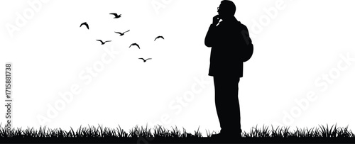 Man Reflecting on Nature at Sunrise