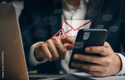 Mobile Email Warning, Business hand checks alert—cyber threats, spam, and quick action.