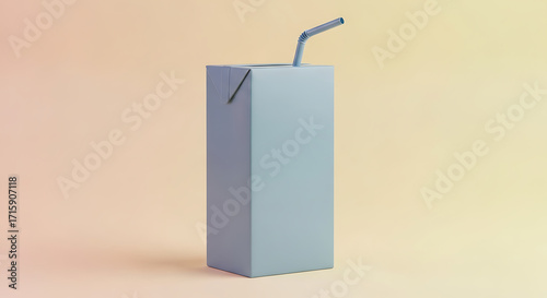 Blue juice box stands upright with a straw on a light peach colored surface, creating a minimalist and refreshing aesthetic.