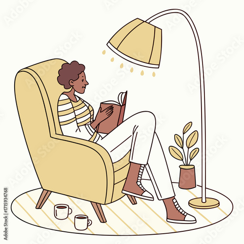 A woman relaxing in a comfortable armchair reading a book under a warm lamp with coffee nearby