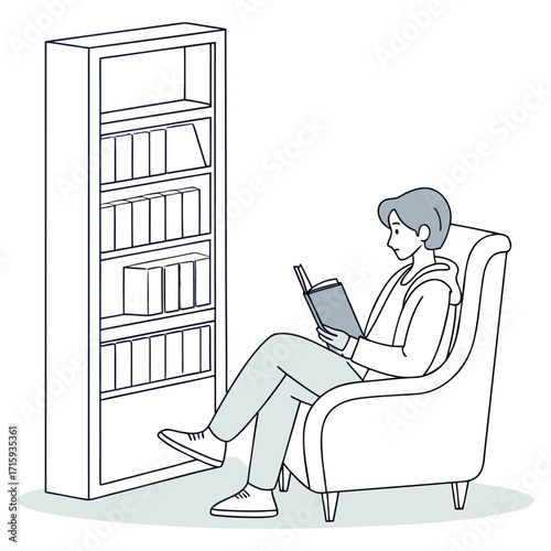 Young person relaxing in a comfortable armchair engrossed in reading a book next to a tall bookshelf
