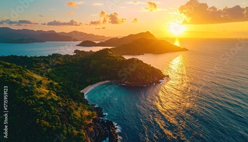 Fototapeta Naklejka Na Ścianę i Meble -  Aerial View of Tropical Island at Sunset Golden Light Reflecting on Ocean Water Horizon Orange and Yellow Sky Palm Trees Sand Beach Cinematic