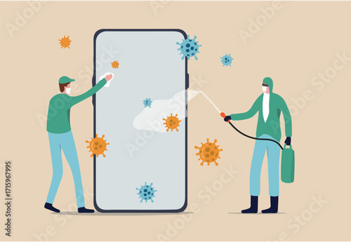 Coronavirus prevention clean your phone, sanitize smartphone and disinfect COVID-19 Coronavirus concept, medical and cleaning service worker with full protective gear sanitize and disinfect cellphone.