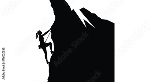 Silhouette of a female rock climber ascending a steep cliff face