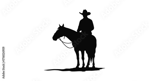 Silhouette of a cowboy on horseback against a stark white background