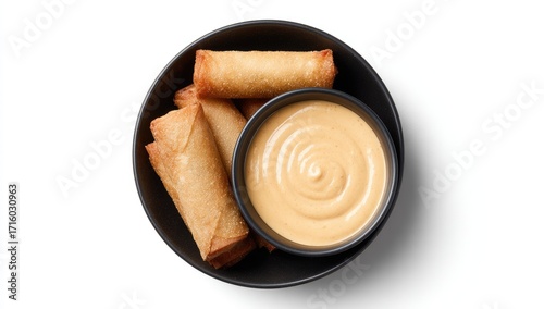 Crispy Fried Spring Rolls Served with Creamy Sauce.
