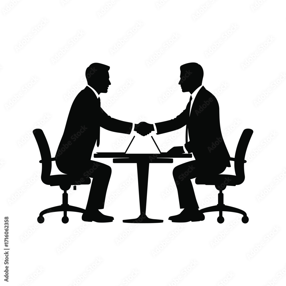 Obraz premium Business handshake between two men sitting at a table with laptops professional agreement success