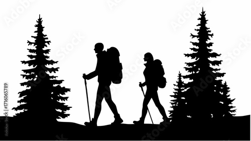 Silhouette of two hikers with backpacks and trekking poles walking between evergreen trees on a trail